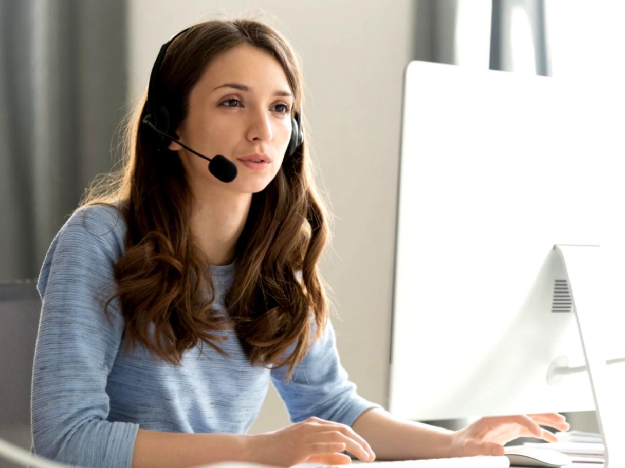 Financial analyst reviewing valuation documentation and professional credentials